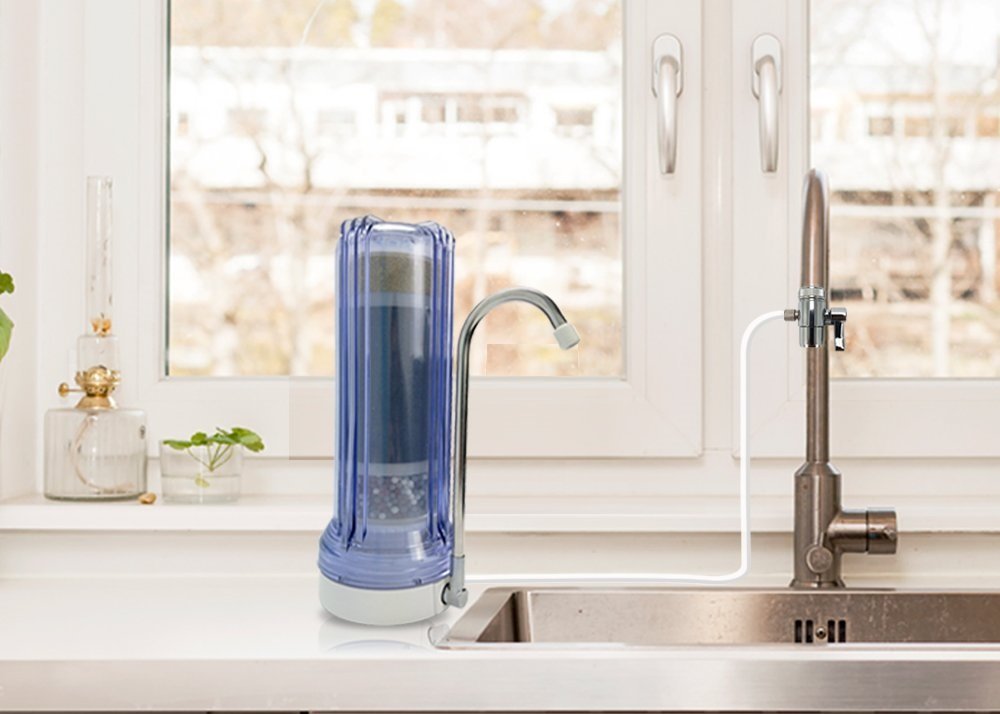 The Apex-1050 water filter installed on the kitchen counter.