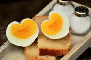 heart shaped eggs served for breakfast