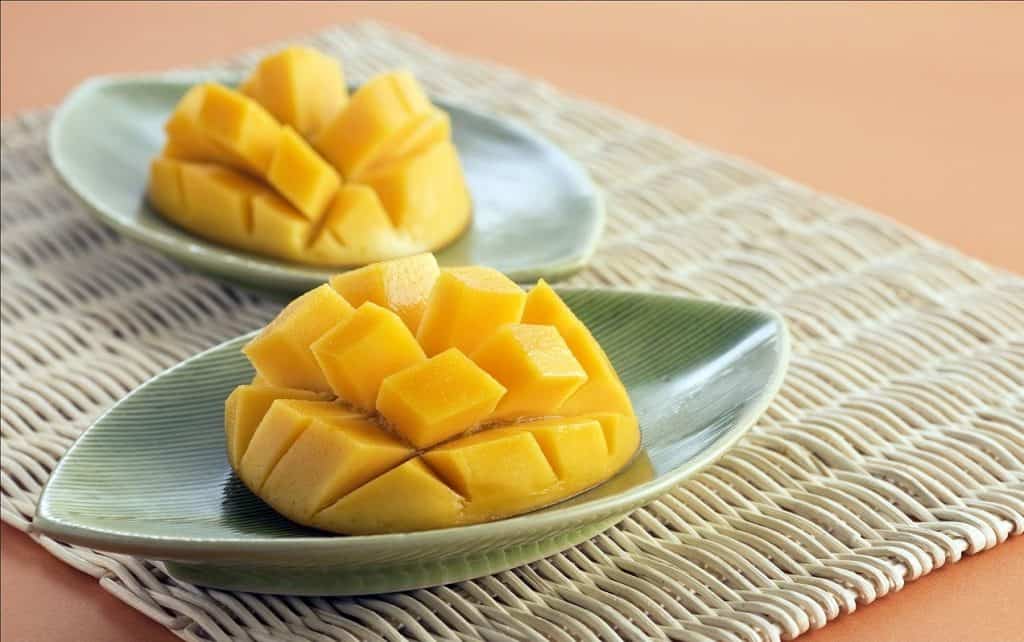 two plates fresh mango